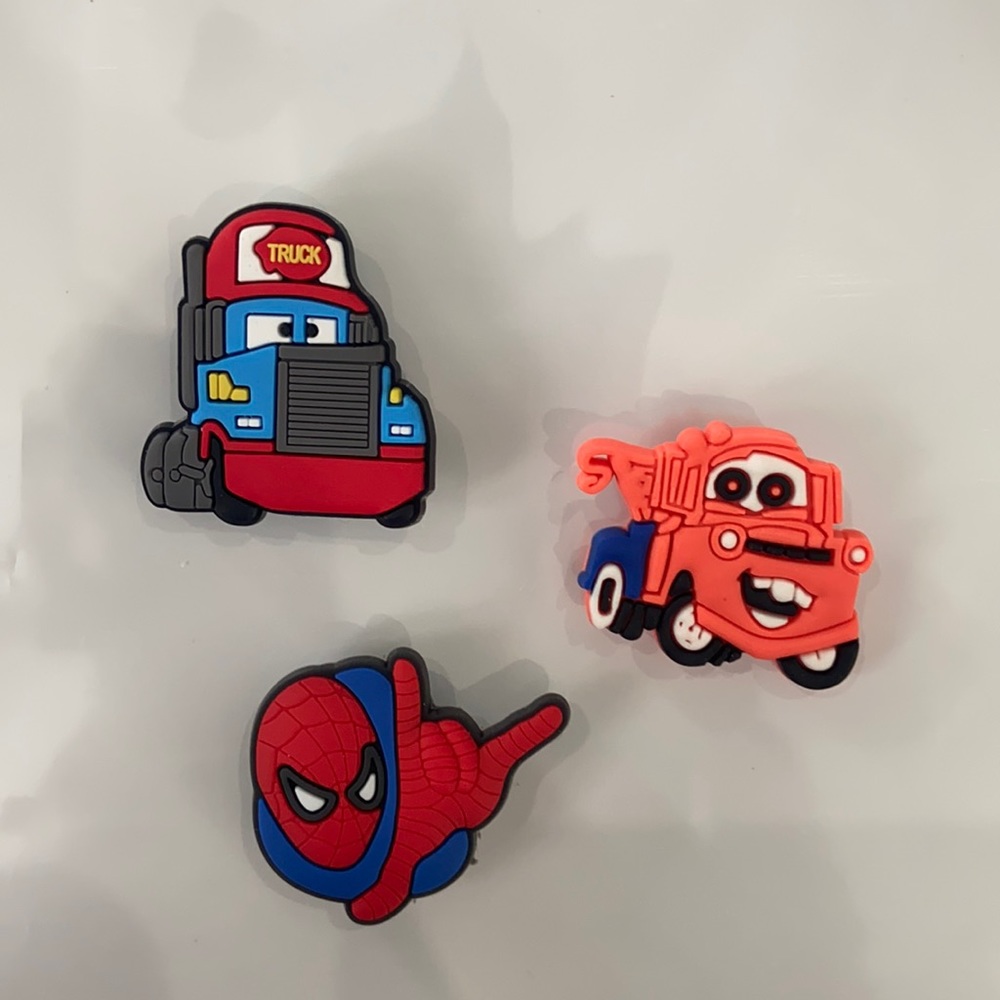 3 Crocs Charms. Trucks and Spiderman.
